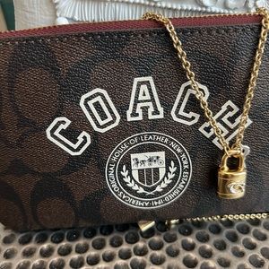 Coach wristlet/wallet and coach necklace bundle
